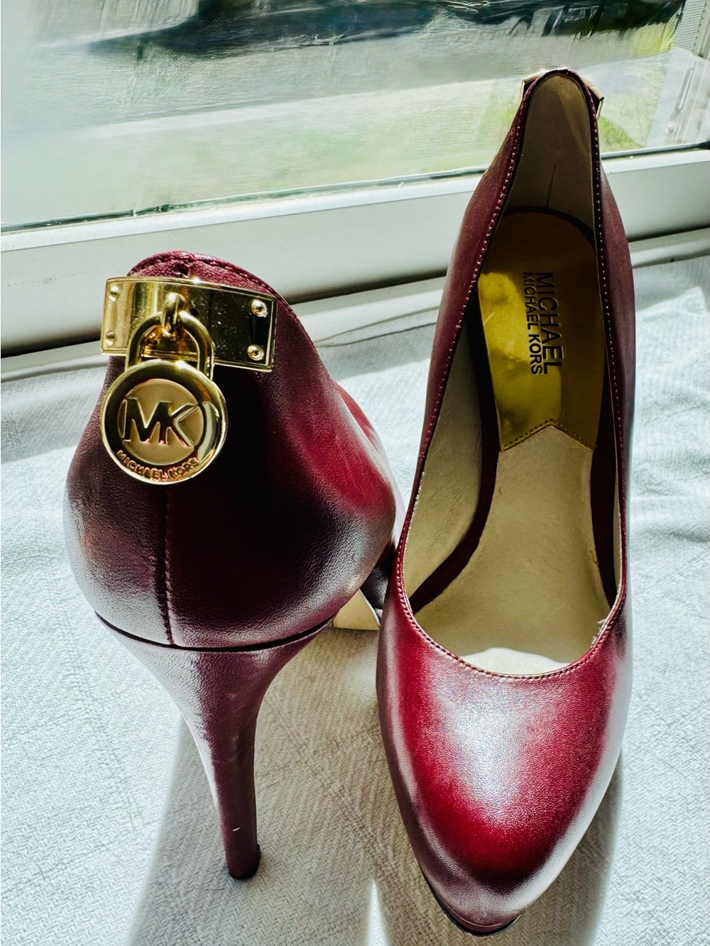 Michael Kors Wine Leather Pointed-Toe Stiletto Pumps with Gold MK Charm